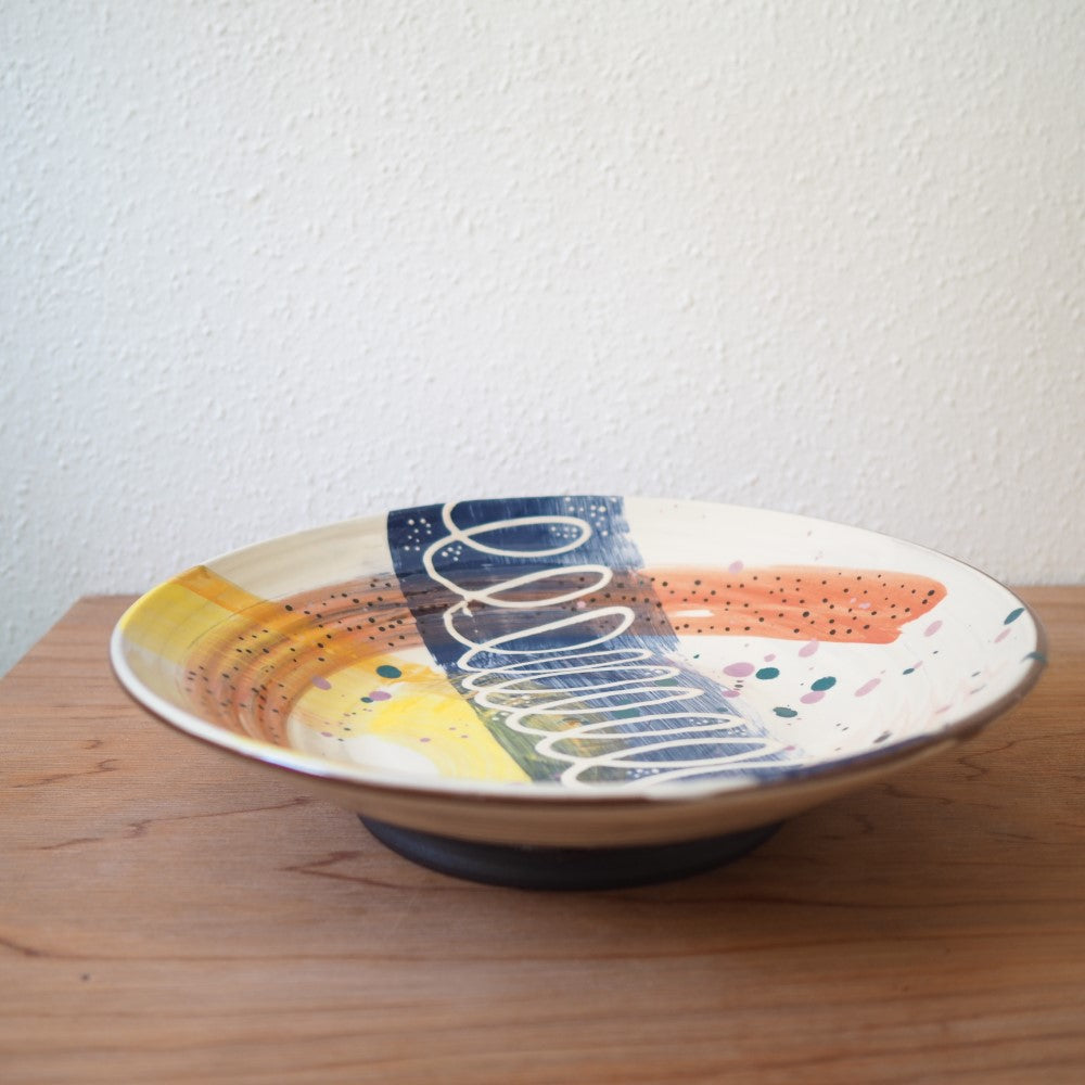 Footed serving bowl