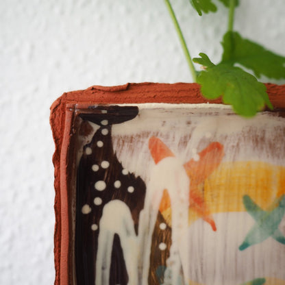 Væghængt vase